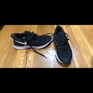 Black & white Nike athletic shoes
